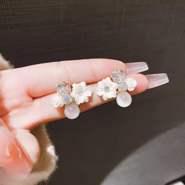flower crystal korean earrings elegant womens fashion jewelry in multiple colors black blue red yellow green sky blue purple light pink dark pink axt 104 4